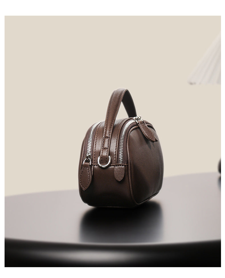 Saddle bag shoulder messenger bag design high-end large capacity genuine leather pleated simple bag