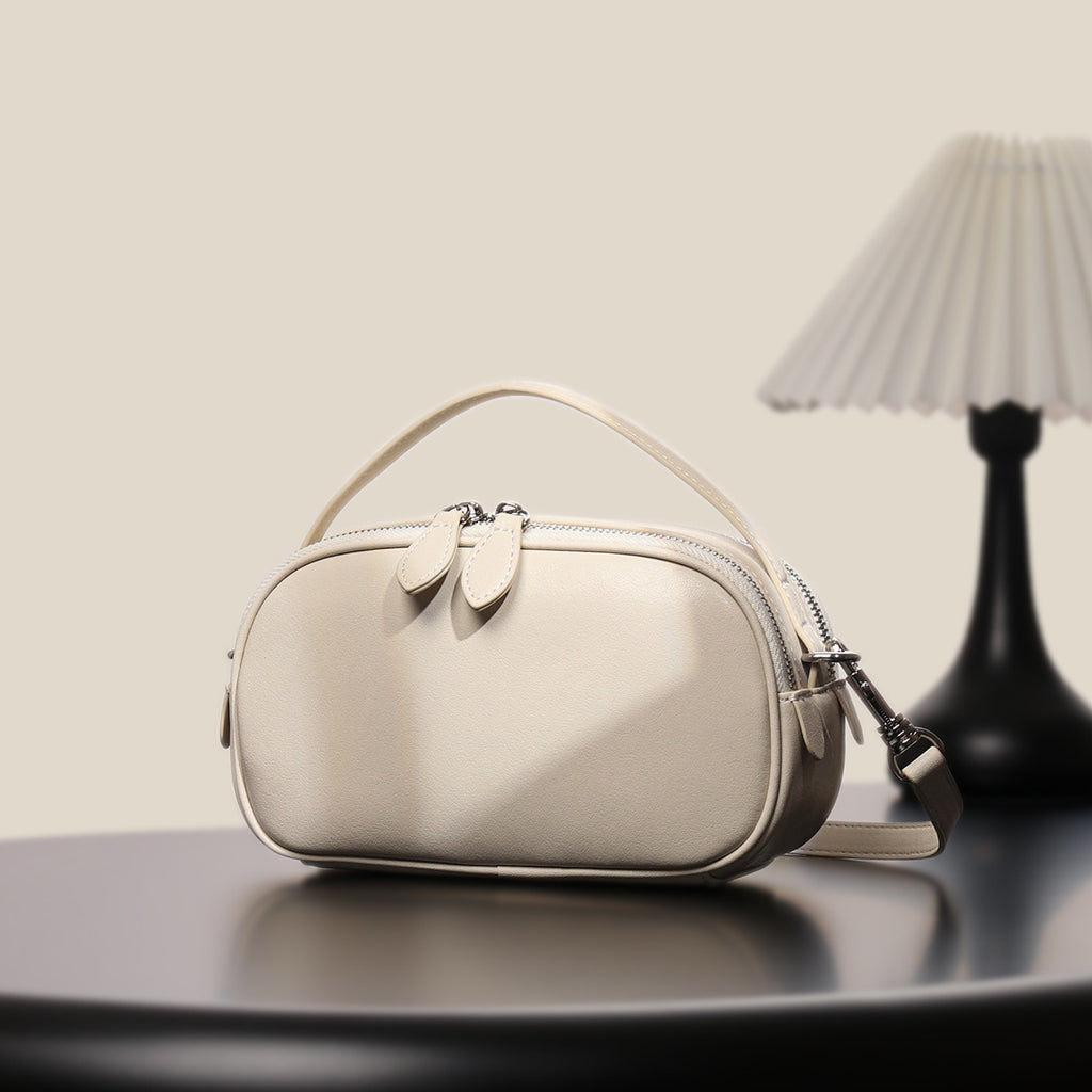 Saddle bag shoulder messenger bag design high-end large capacity genuine leather pleated simple bag