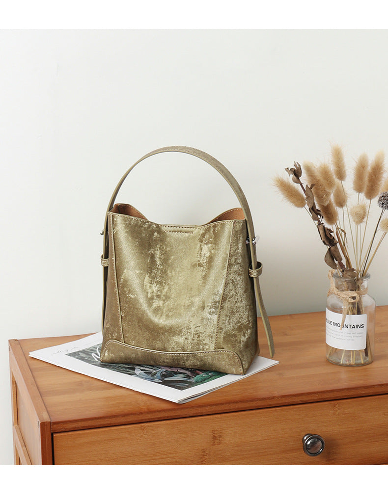 Large capacity high-grade genuine leather women's bag commuter niche shoulder crossbody women's bucket bag