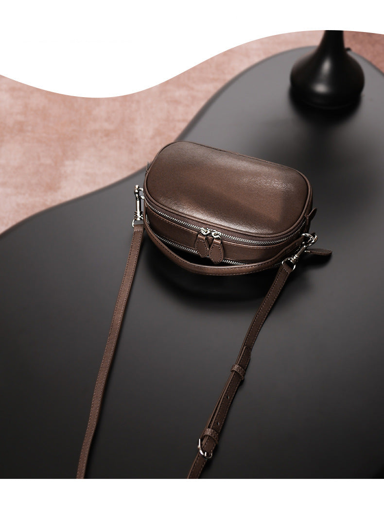 Saddle bag shoulder messenger bag design high-end large capacity genuine leather pleated simple bag
