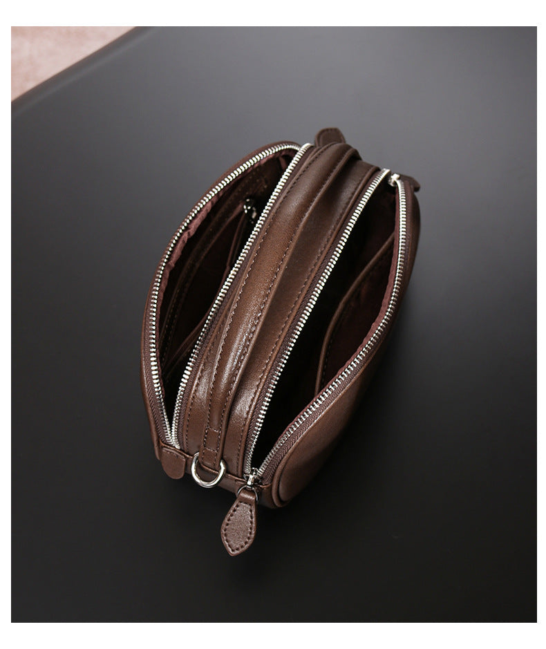 Saddle bag shoulder messenger bag design high-end large capacity genuine leather pleated simple bag