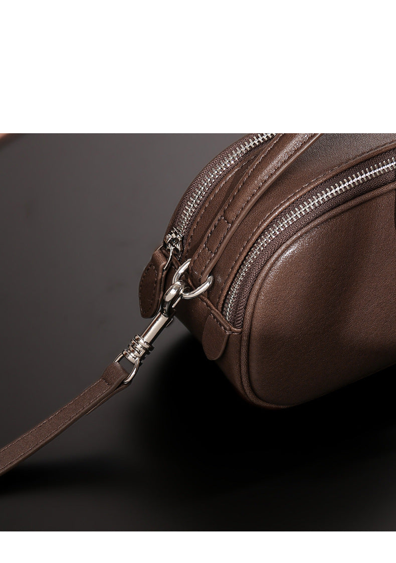 Saddle bag shoulder messenger bag design high-end large capacity genuine leather pleated simple bag